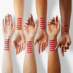 Miniling lip-cheek tint demonstrates multi-use application on lips and cheeks.