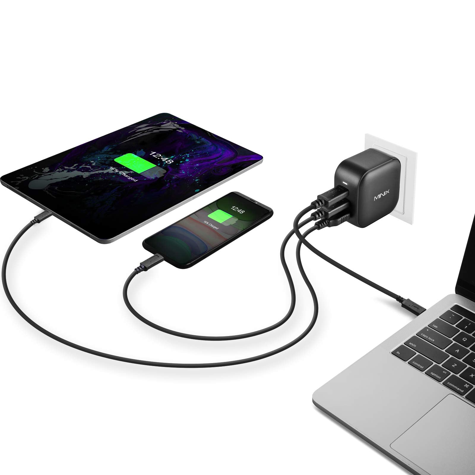 MINIX 66W Turbo in use on desk powering laptop and phone