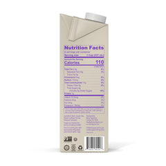 Minor Figures Barista Oat Organic 32oz bottle pour shows smooth cafe-style texture