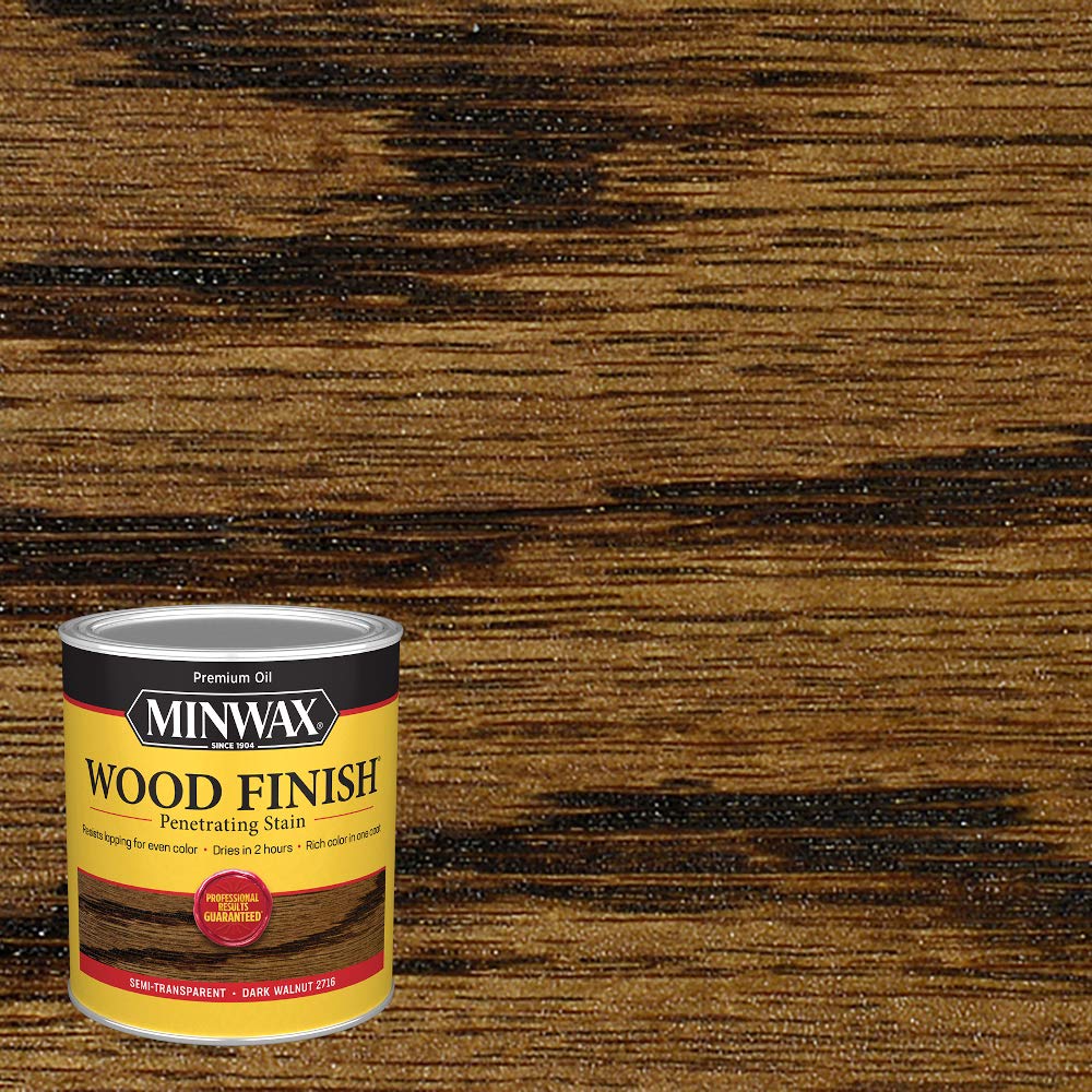Minwax Dark Walnut stain applied with cloth for smooth coverage.