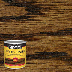 Minwax Dark Walnut stain applied with cloth for smooth coverage.