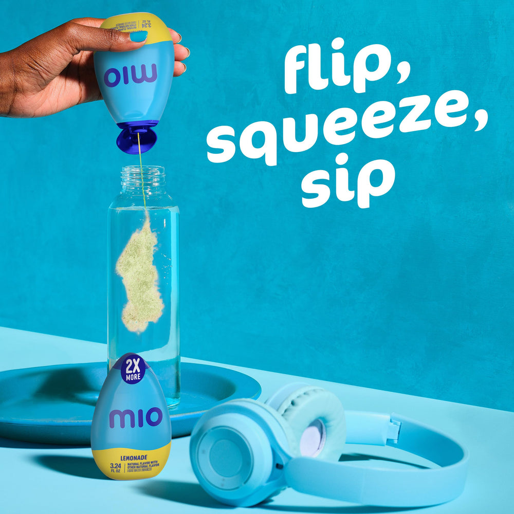 Drops dispensing into water with Mio Lemonade for flavor