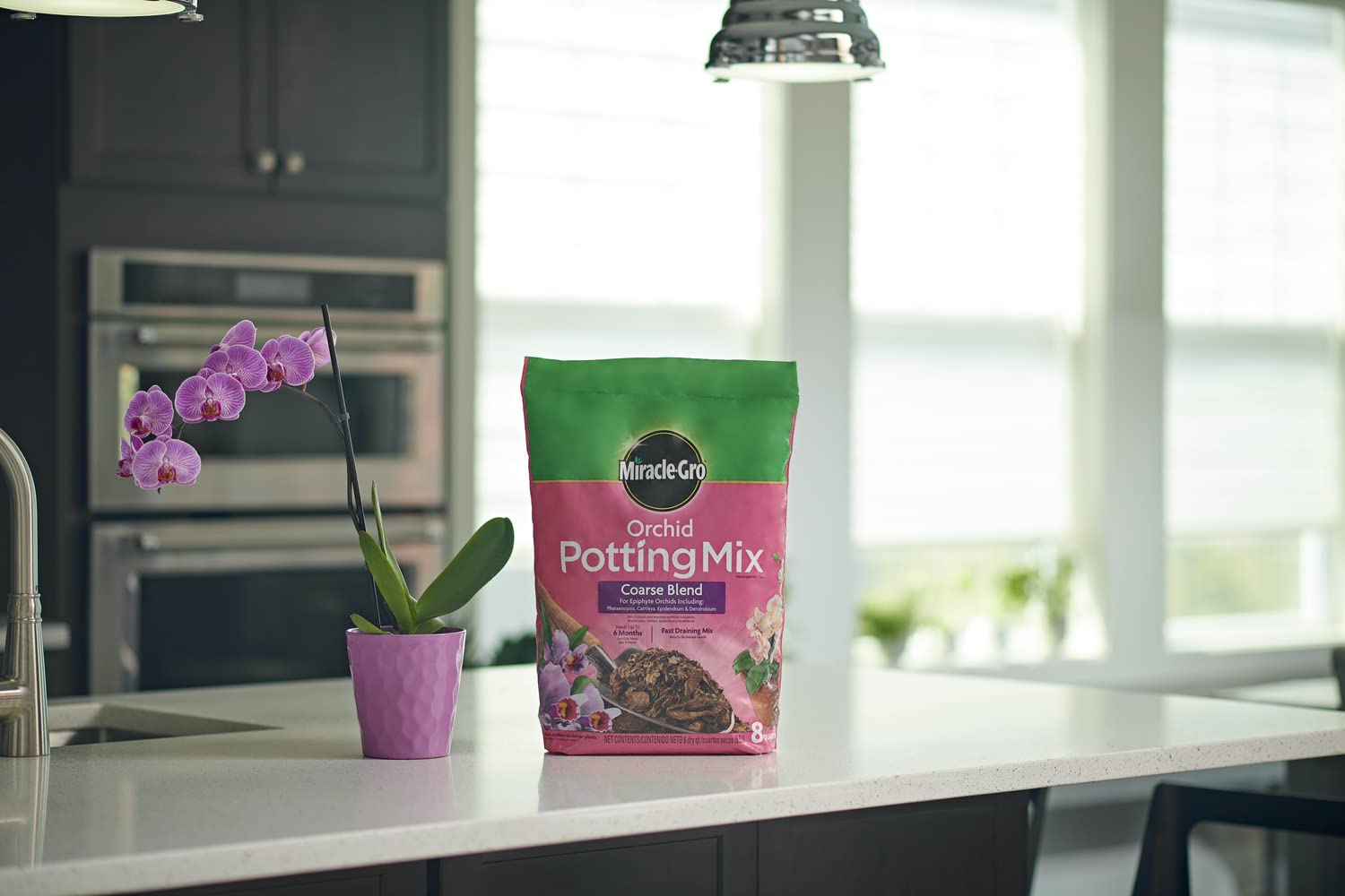 Miracle-Gro Orchid Potting Mix coarse blend shows fast-draining texture