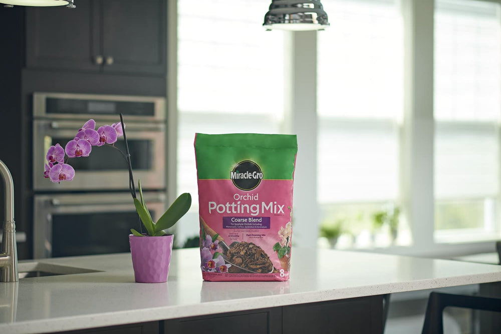 Miracle-Gro Orchid Potting Mix coarse blend shows fast-draining texture