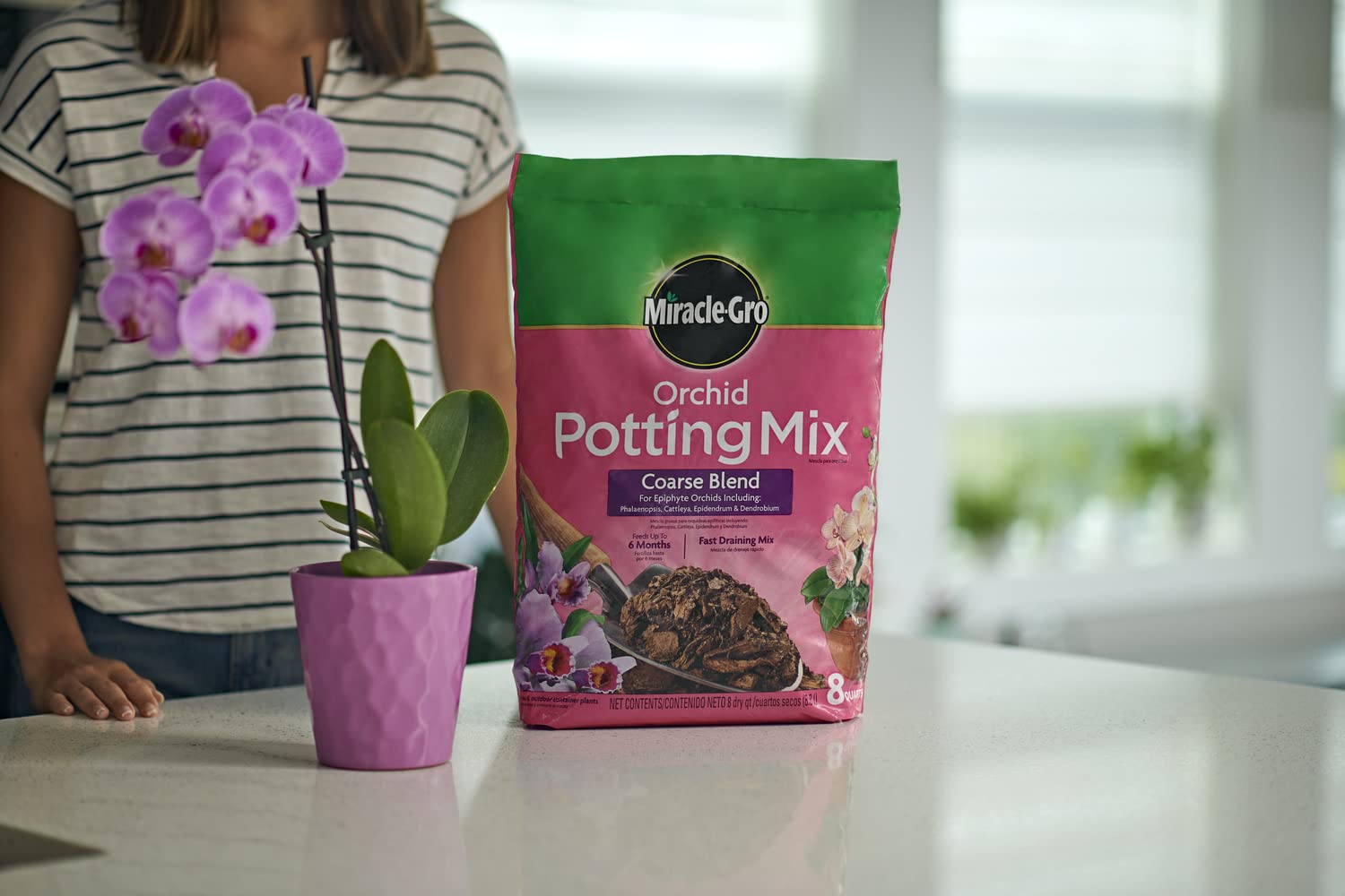 Miracle-Gro Orchid Potting Mix coarse blend labeled for up to six months of feeding
