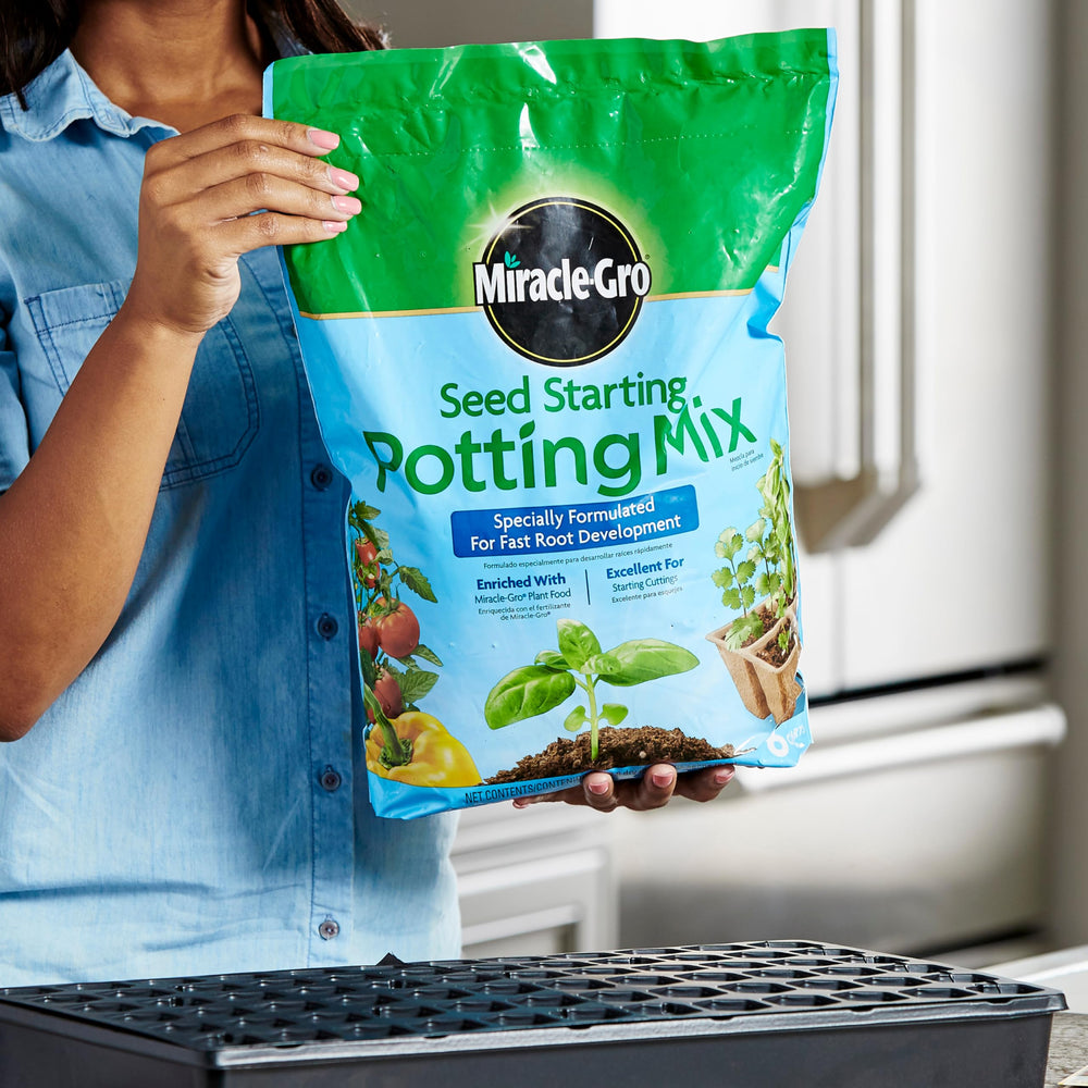 Seeds starting in a tray with Miracle-Gro Seed Starting Potting Mix for even germination