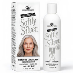 Miracle of Aloe Softly Silver Shampoo bottle close-up showing the restorative formula.