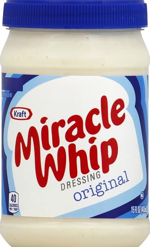 Miracle Whip on a layered sandwich for tangy flavor boost