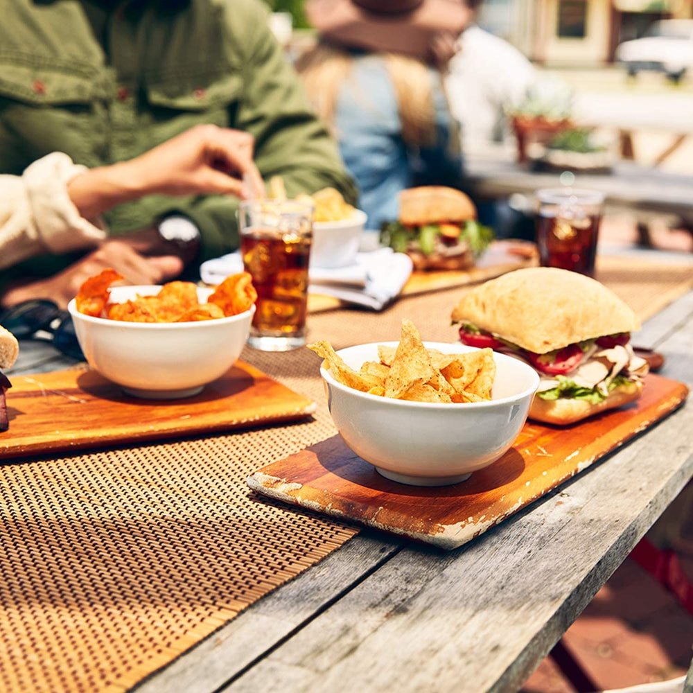 Chips in a lunchbox pair with salsa for a quick snack.
