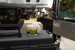 Mission Automotive receiver hitch pin grease applied to pin to reduce wear and corrosion.