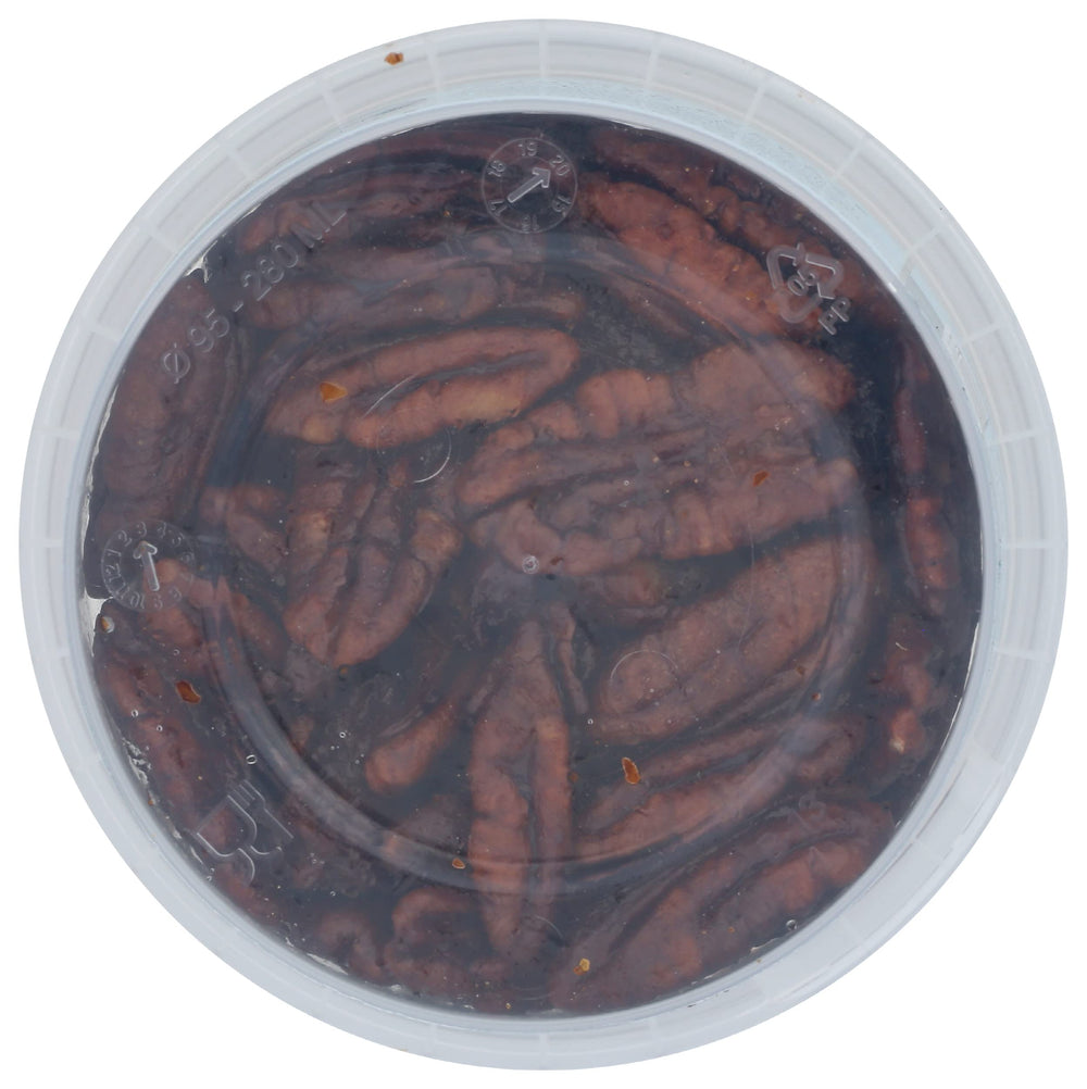 Mitica caramelized pecans dessert topping adds warmth and texture to sweets.