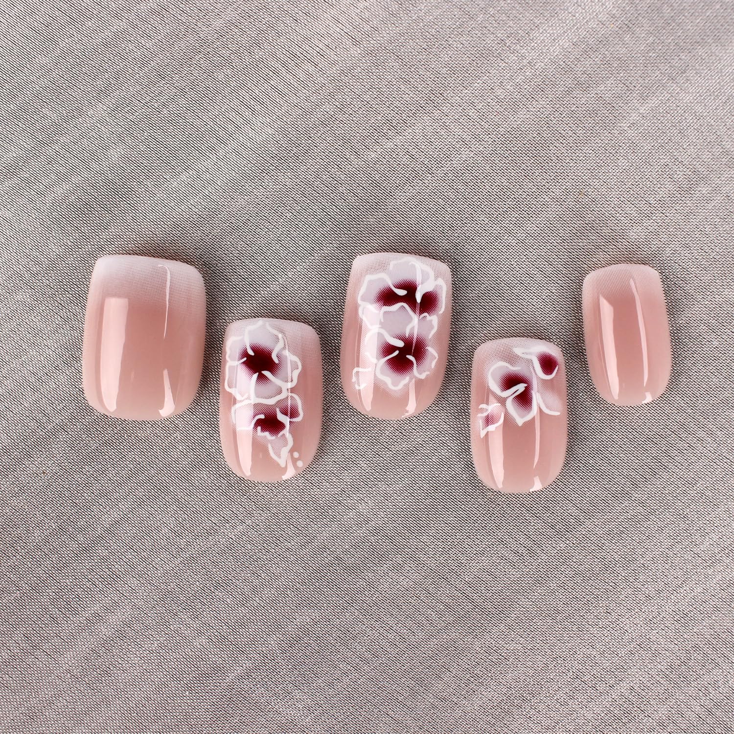 Mivota close-up of white silver flower nail art