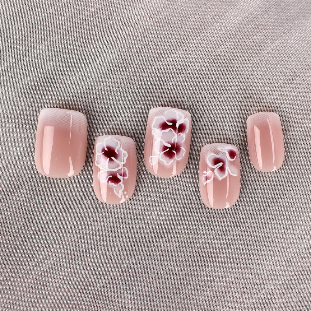 Mivota close-up of white silver flower nail art