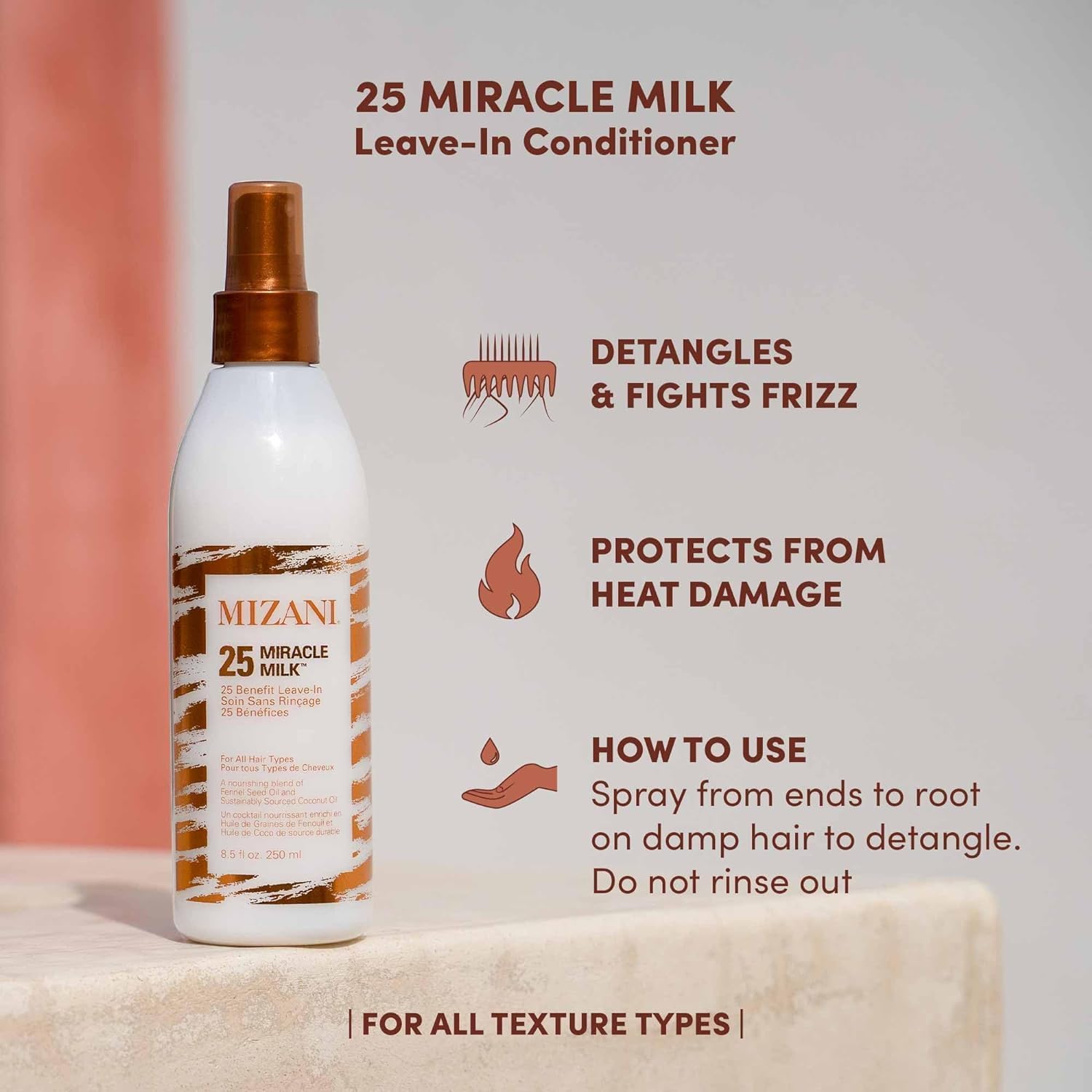 Mizani Miracle Milk spray action demonstrates detangling and frizz control for curls