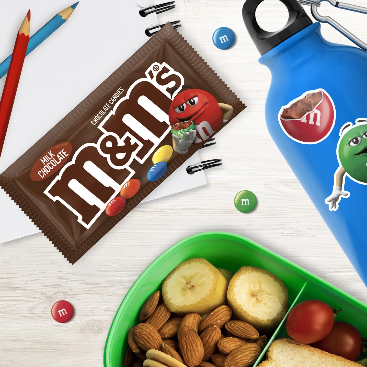 Office desk treats with bulk M&M'S candy.