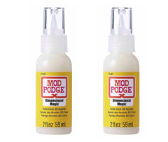 Mod Podge Dimensional Magic bottle front view showing clear gloss for crafts