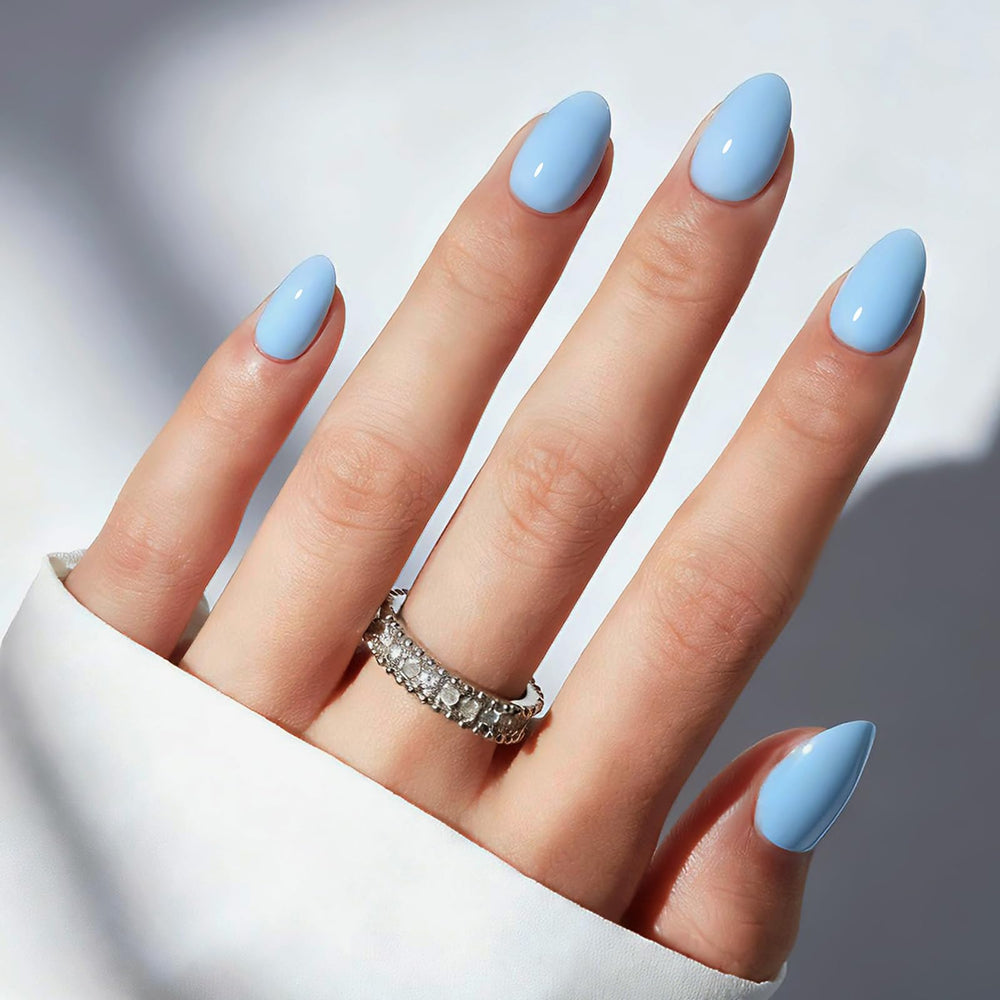 Modelones blue short press on nails in oval shape ready for quick manicure