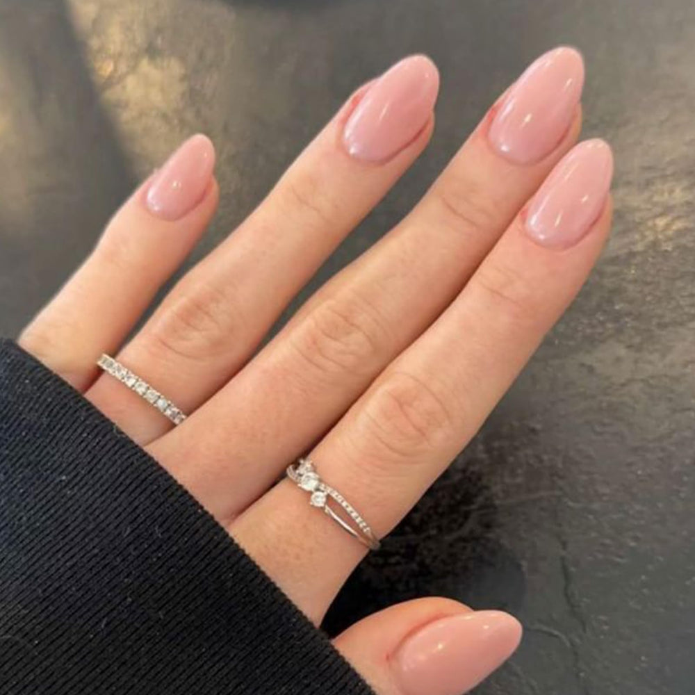 Modelones pink press-on almond nails for a quick, stylish manicure.