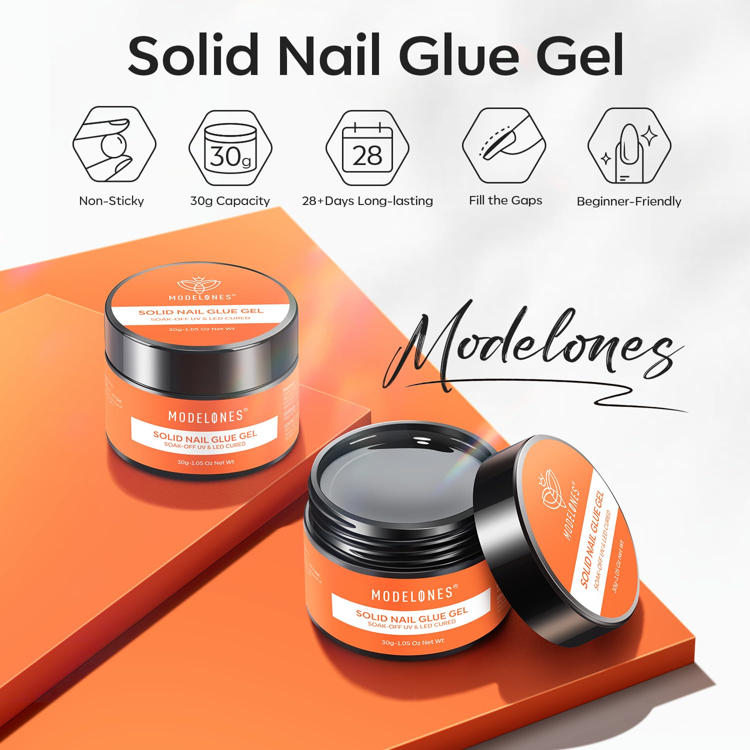 Modelones glue application close-up shows easy adjustability after nail tip placement