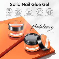 Modelones glue application close-up shows easy adjustability after nail tip placement