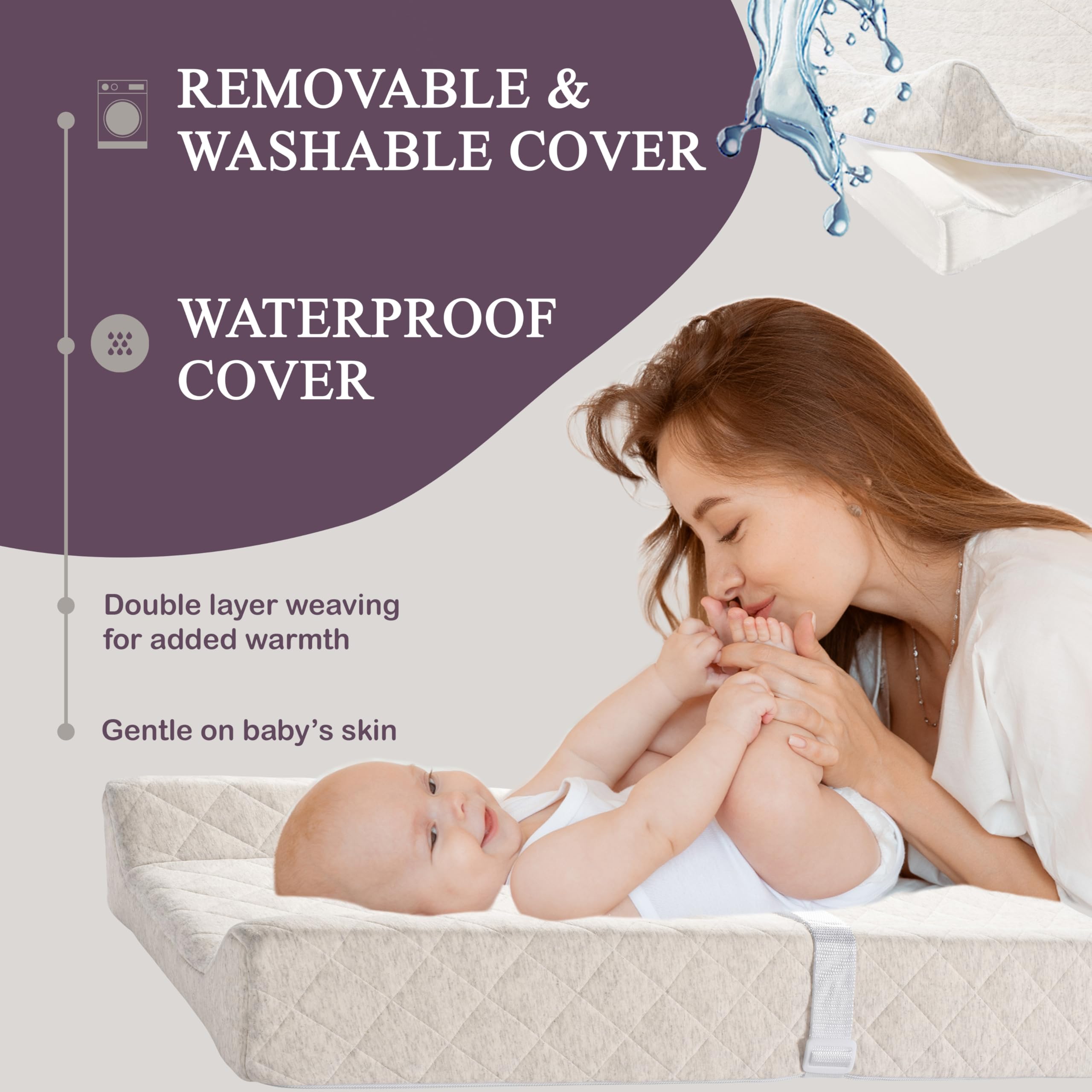 Modera baby changing pad safety strap secures newborn during diapering