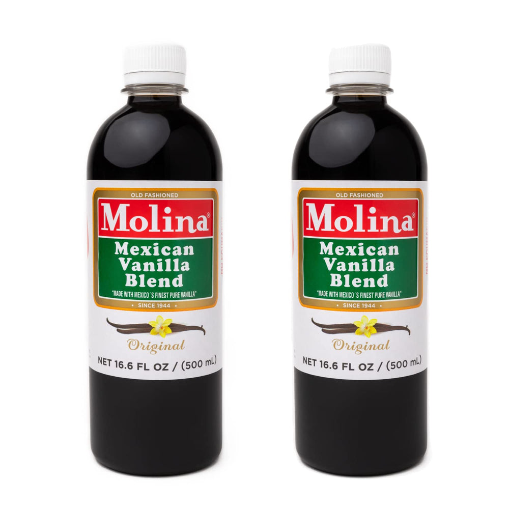 Molina Vanilla bottle pour showing pure vanilla for baking and flavor enhancement.