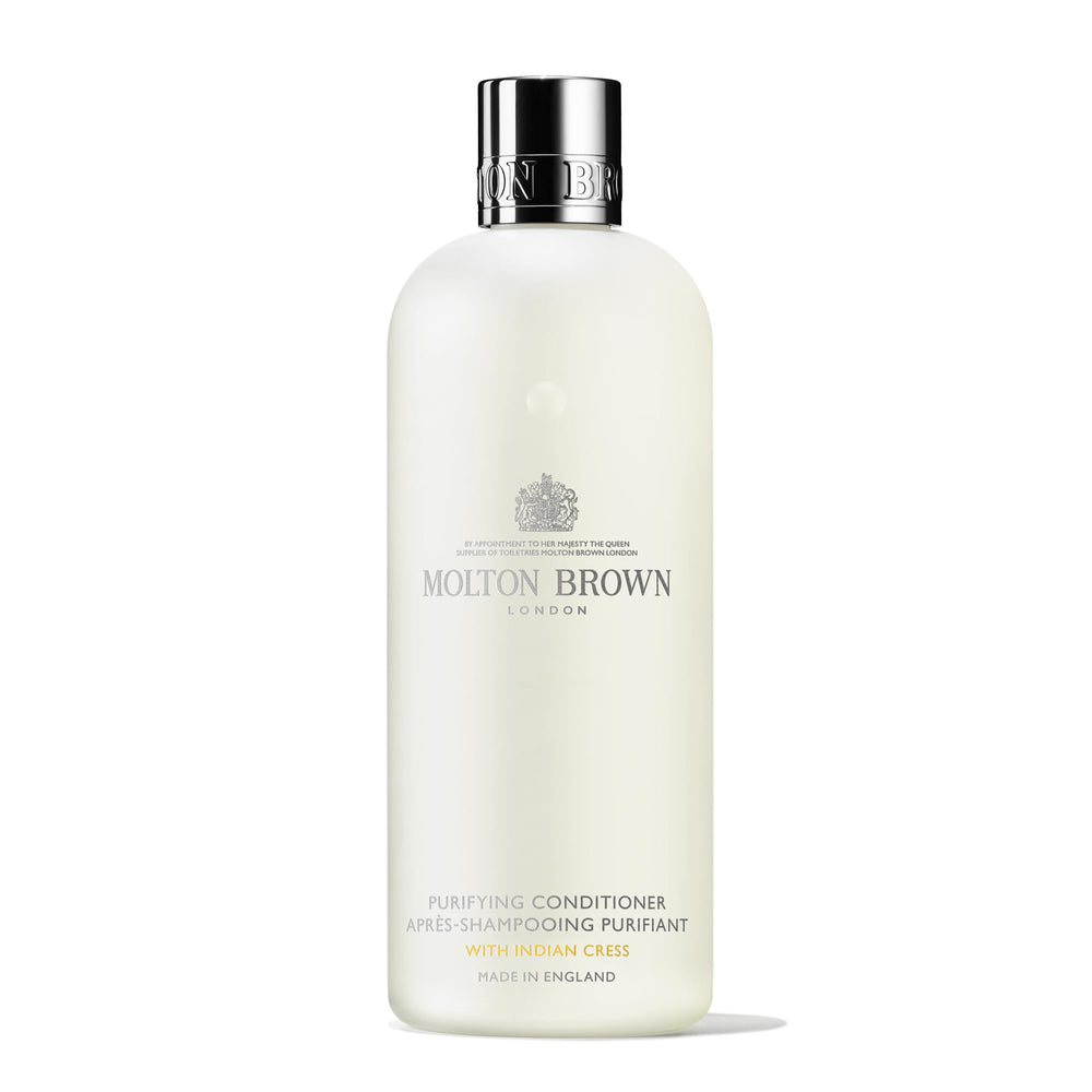 Molton Brown Purifying Conditioner bottle ready to detangle and soften hair