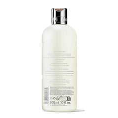 Close-up of Indian Cress conditioner label highlights vegan cruelty-free formula