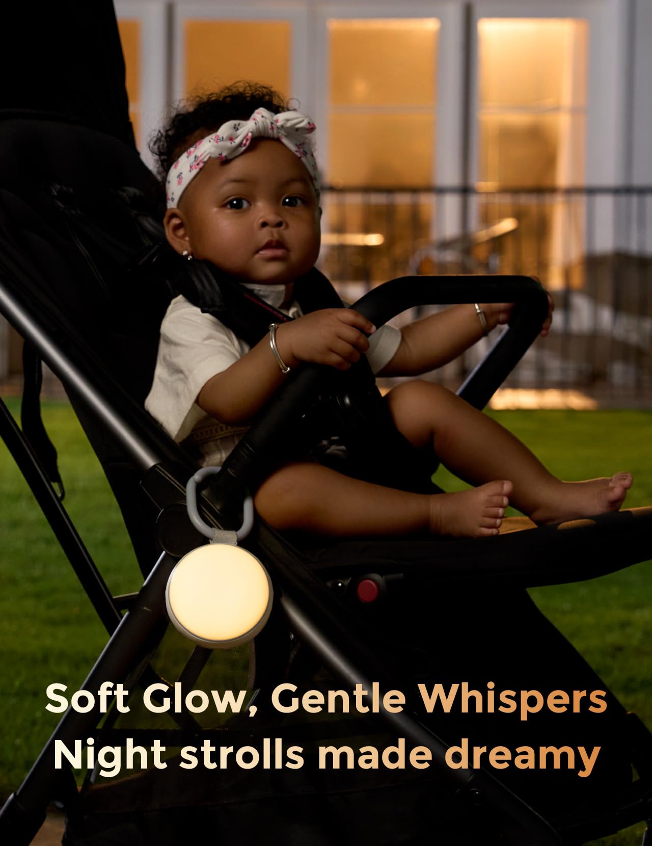 Momcozy amber night light provides gentle visibility without fully waking baby.