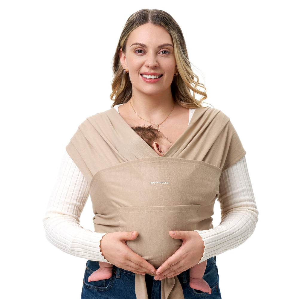 Momcozy Baby Wrap Carrier on body shows lightweight comfort for daily wear.