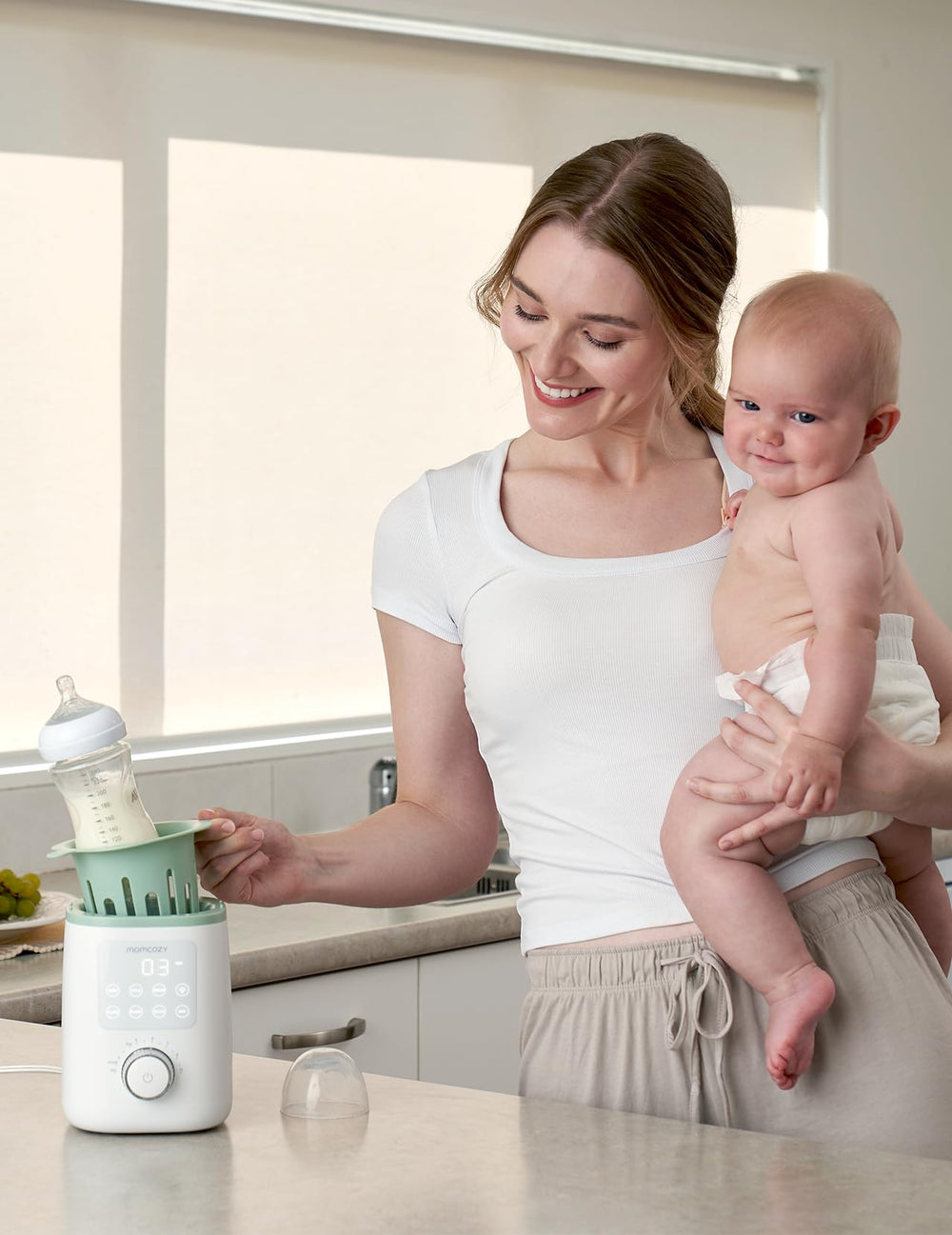 Momcozy warmer heats milk in 3–5 minutes