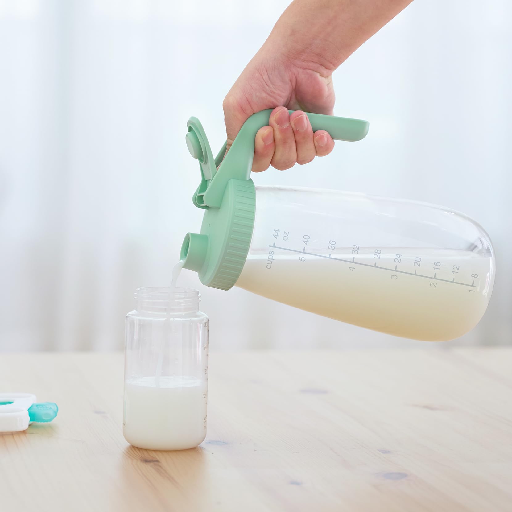 Momcozy Glass Breast Milk Pitcher for formula and beverages alike