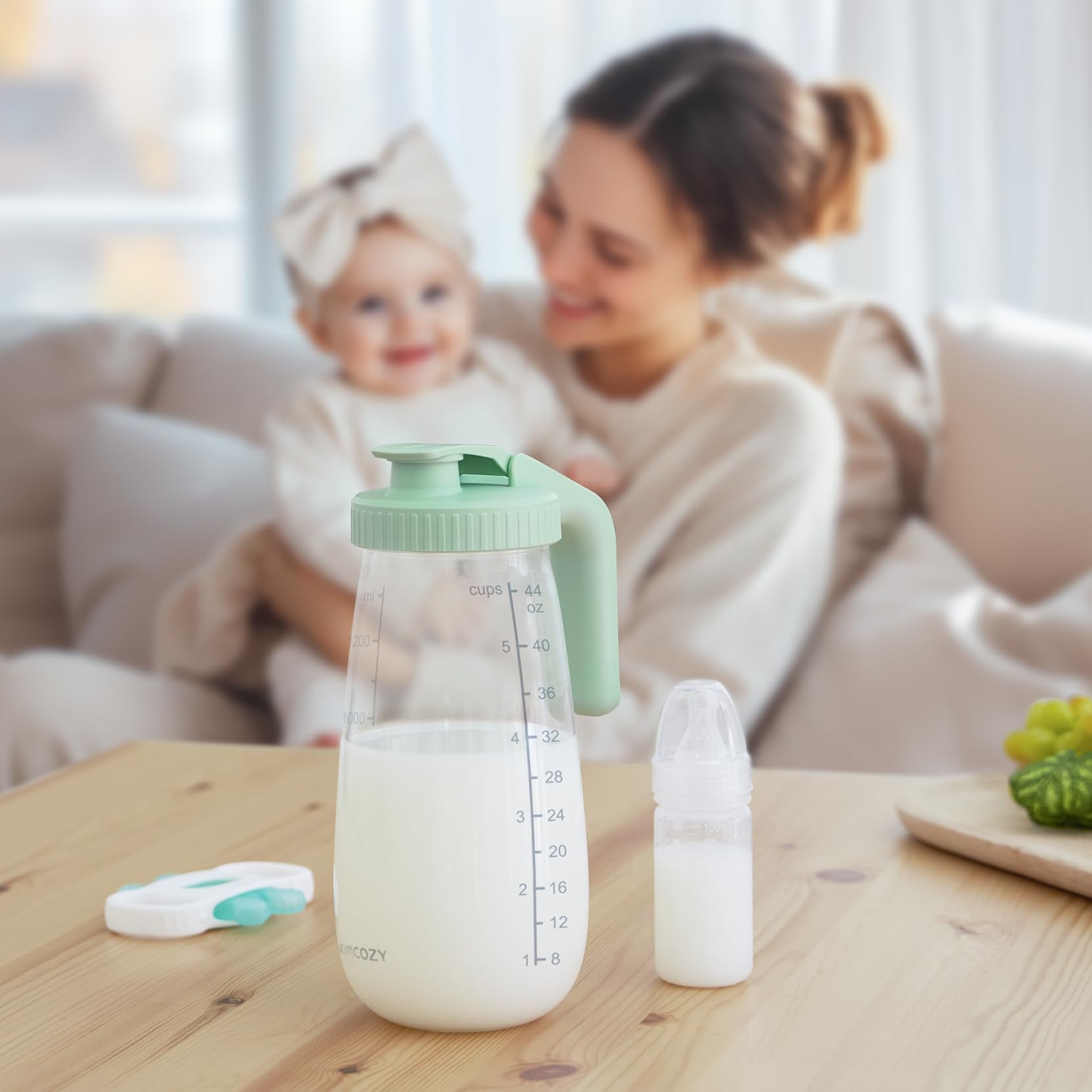 Momcozy Glass Breast Milk Pitcher wide opening simplifies pouring and cleaning