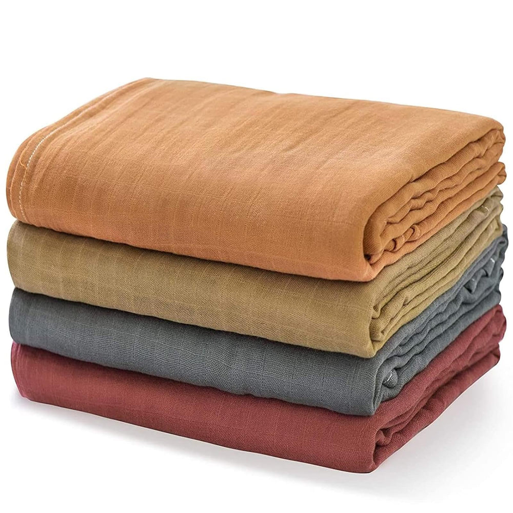 Momcozy muslin swaddle blanket large 47x47 in warm amber for secure newborn swaddling