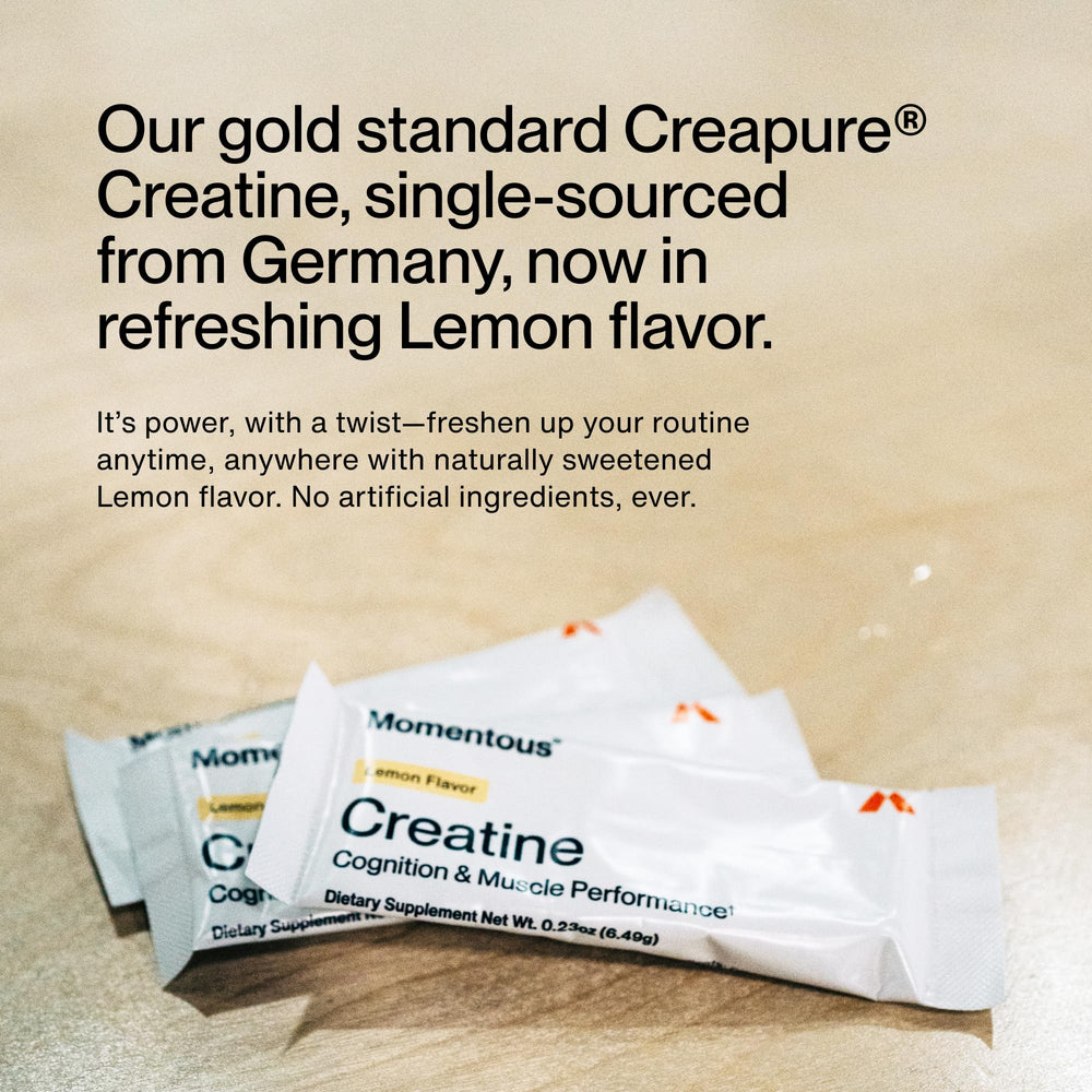 Momentous Creatine Lemon Powder dissolving in glass demonstrating solubility