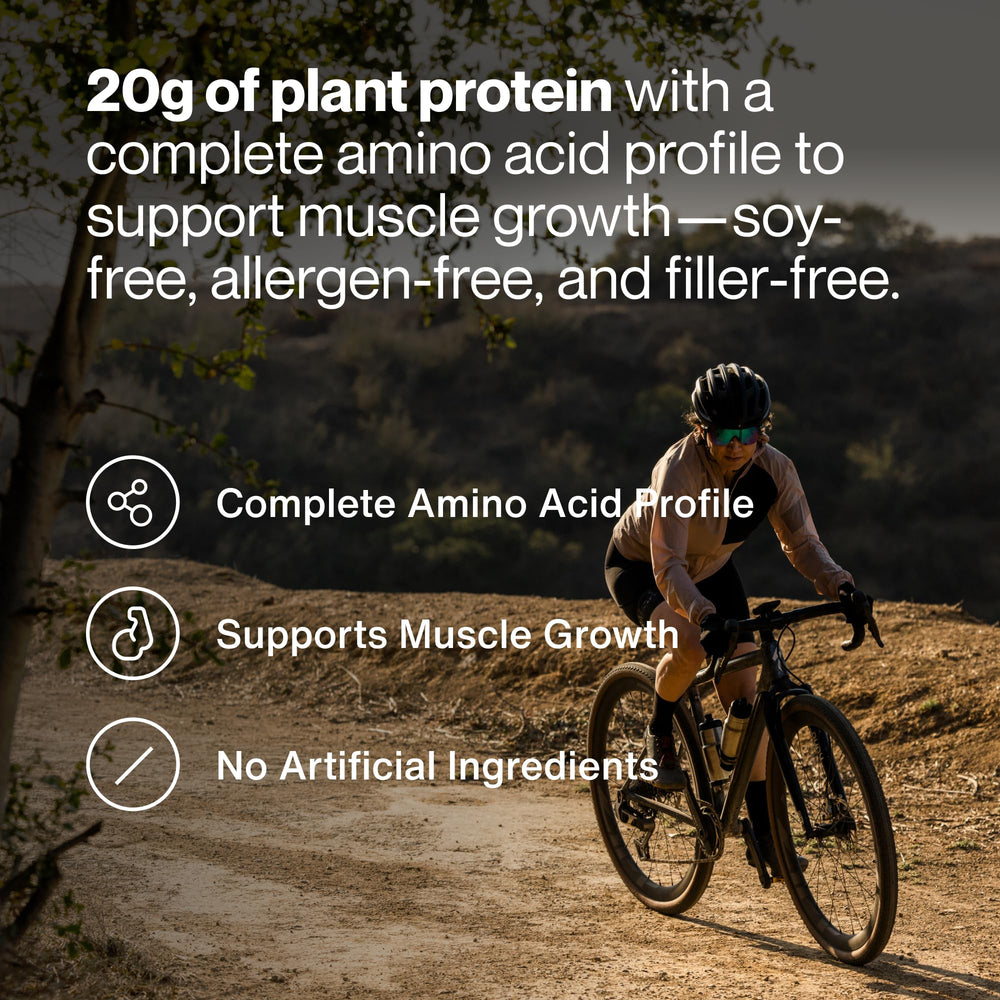 Momentous vegan protein scoop beside powder for easy daily fueling.