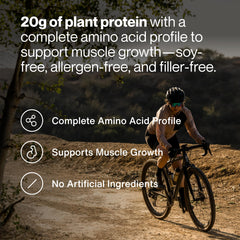 Momentous vegan protein scoop beside powder for easy daily fueling.