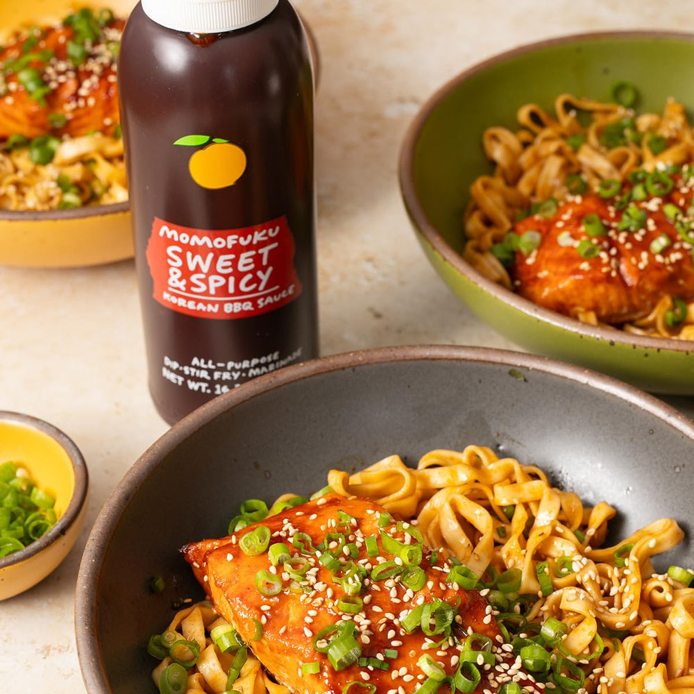 Chef’s kitchen setup featuring Momofuku Sweet & Spicy Korean BBQ Sauce.