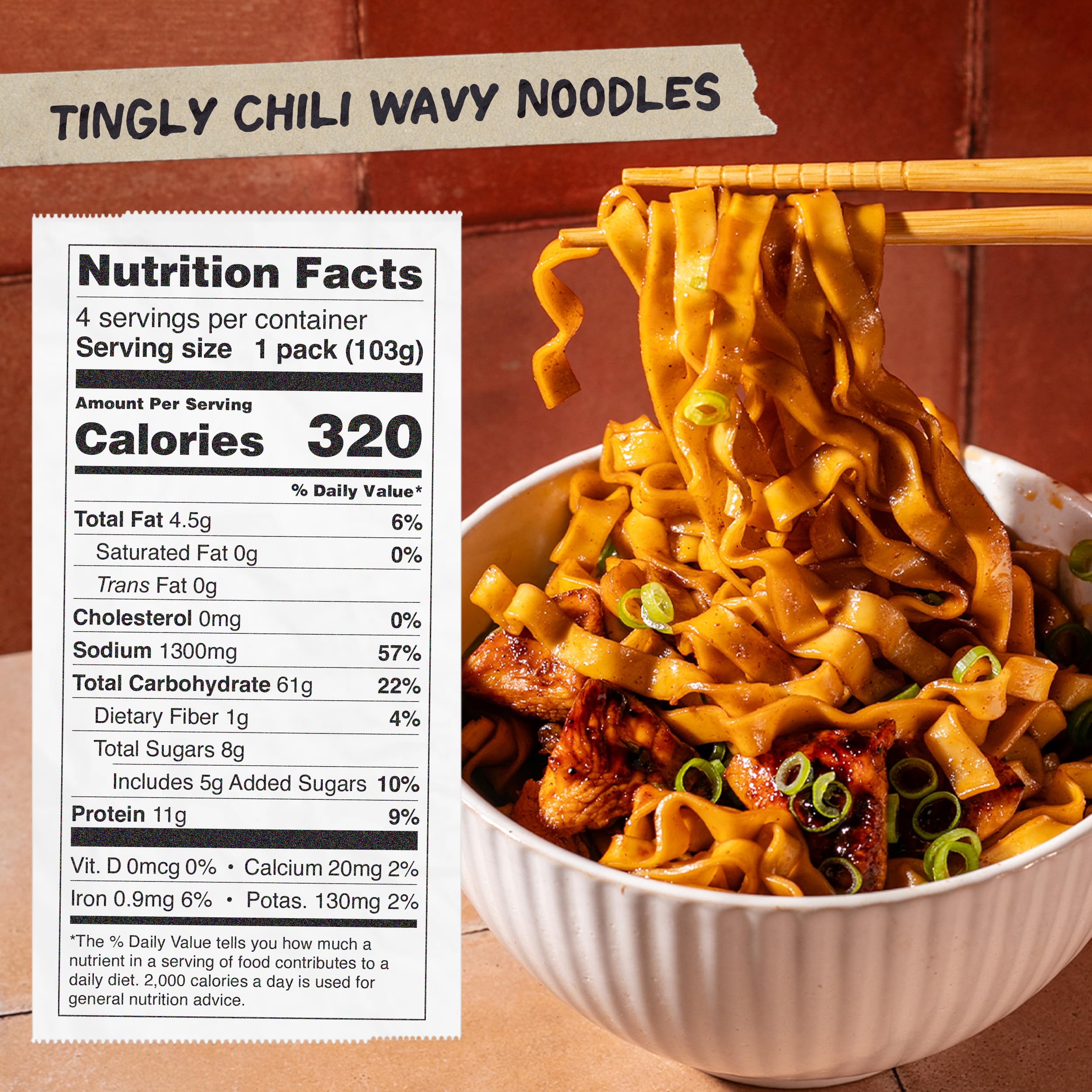 Open package of Momofuku Tingly Chili Noodles with sauce sachets