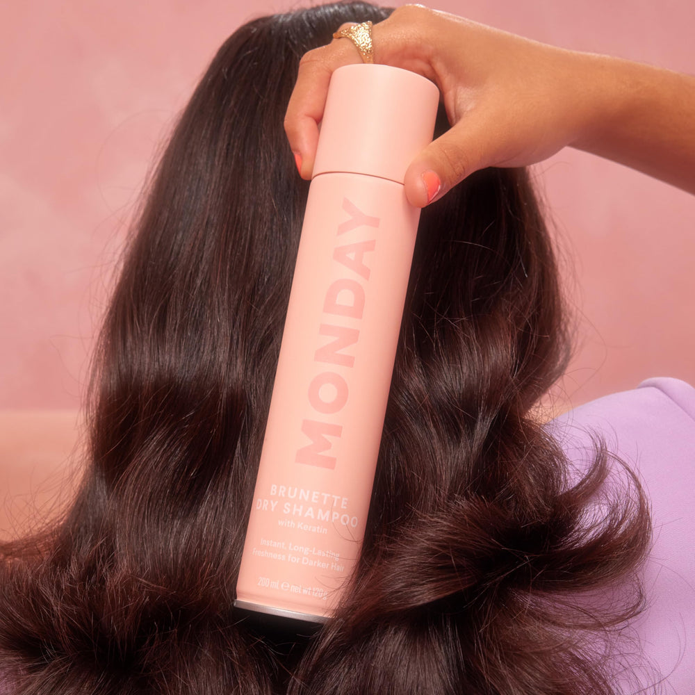 MONDAY Haircare Brunette Dry Shampoo gardenia scent enhances the refresh ritual.