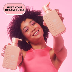 Coconut oil detail on CURL DEFINE product highlighting hydration and shine for curls