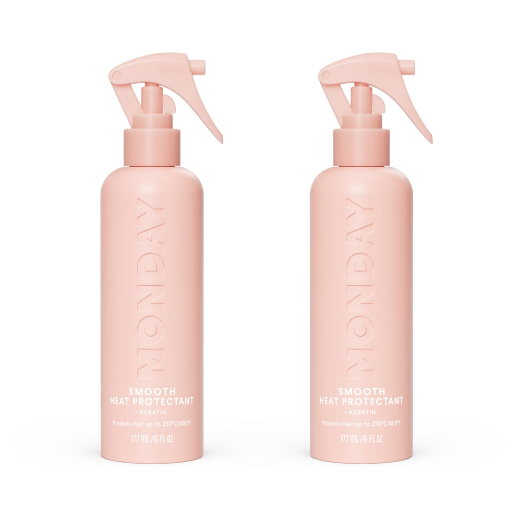 MONDAY Haircare SMOOTH heat protectant bottle shielding heat during styling