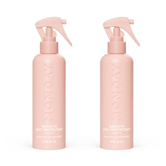 MONDAY Haircare SMOOTH heat protectant bottle shielding heat during styling