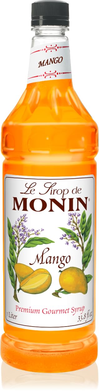 Monin Mango Syrup cocktail with mango garnish demonstrates tropical potential