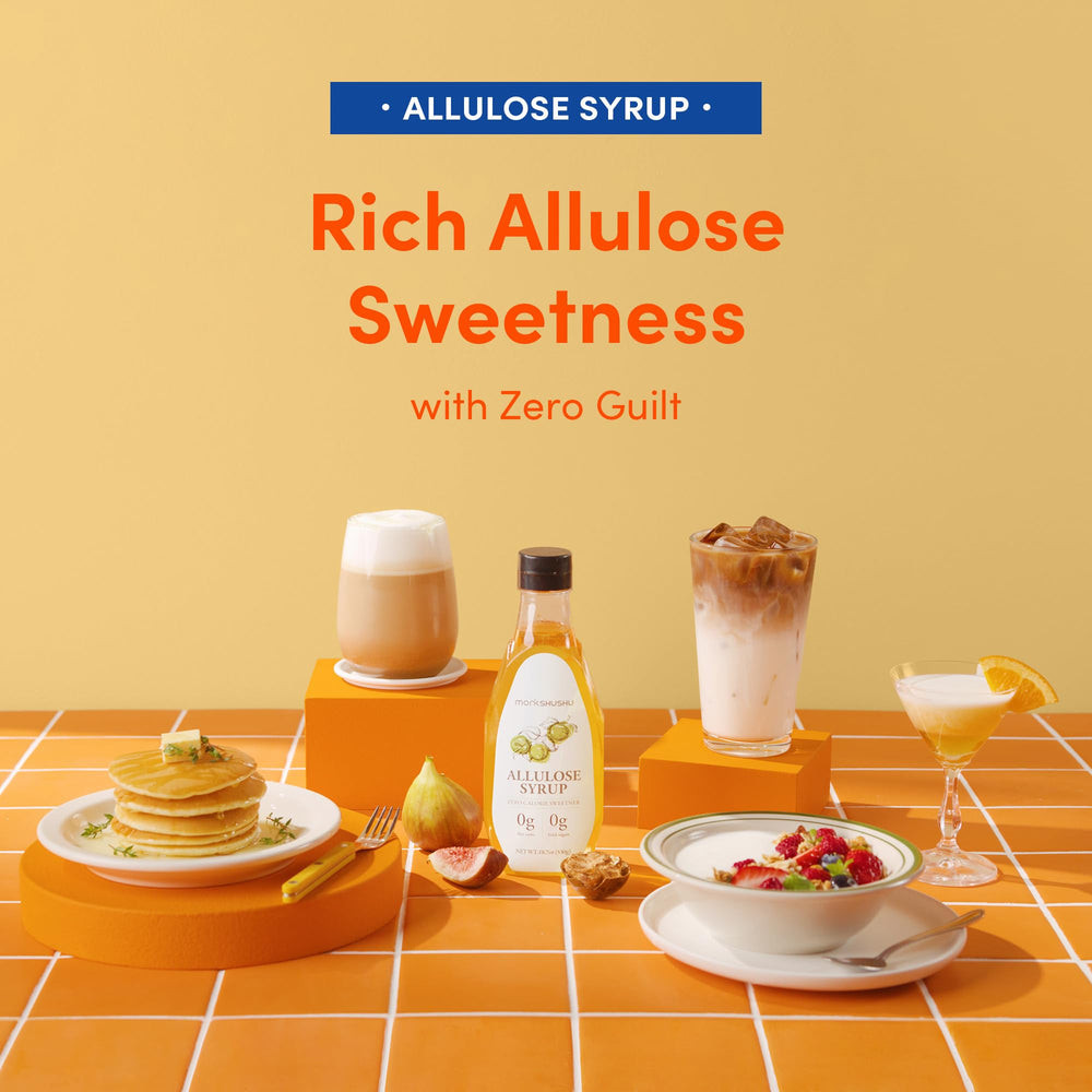 MONKSHUSHU Allulose Syrup with a cocktail glass suggests versatile keto-friendly sweetness