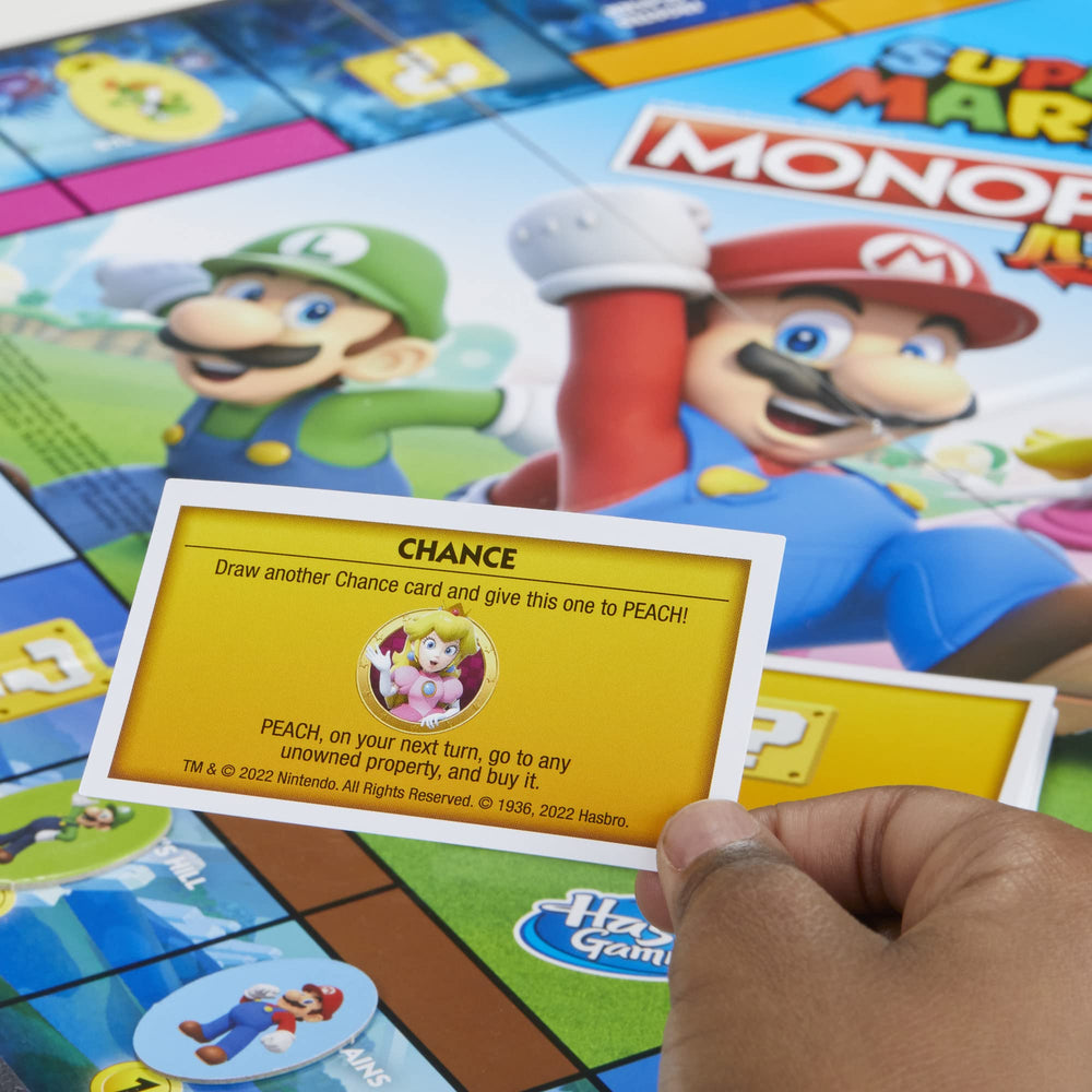 Monopoly Junior Super Mario Edition Peach character piece ready for play.