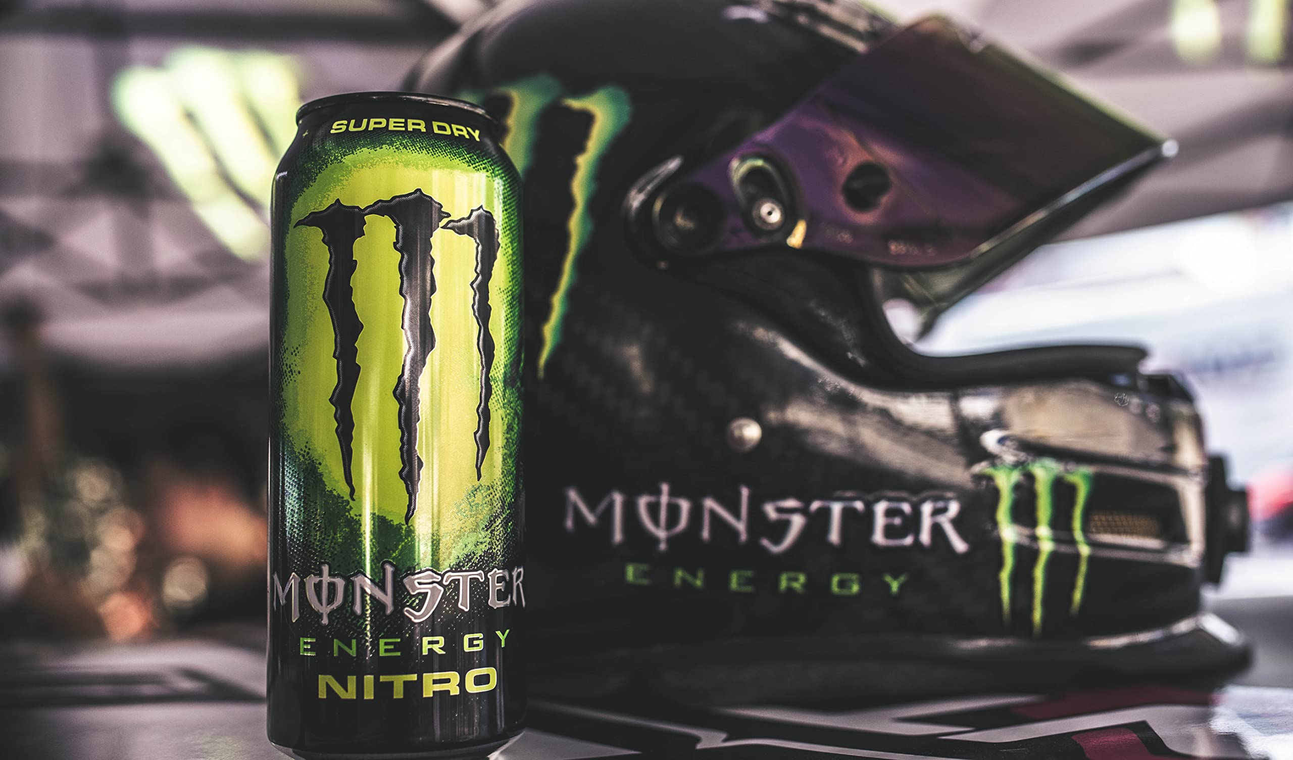 Shelf display of a 15-pack Monster Nitro Super Dry for stocking up.