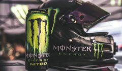 Shelf display of a 15-pack Monster Nitro Super Dry for stocking up.