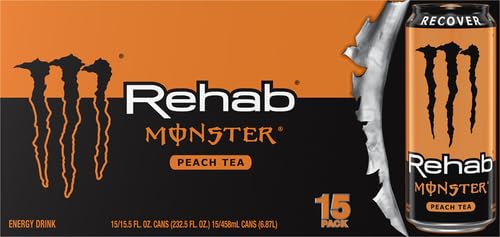 Pouring Monster Rehab Peach Tea + Energy into a glass for a refreshing sip