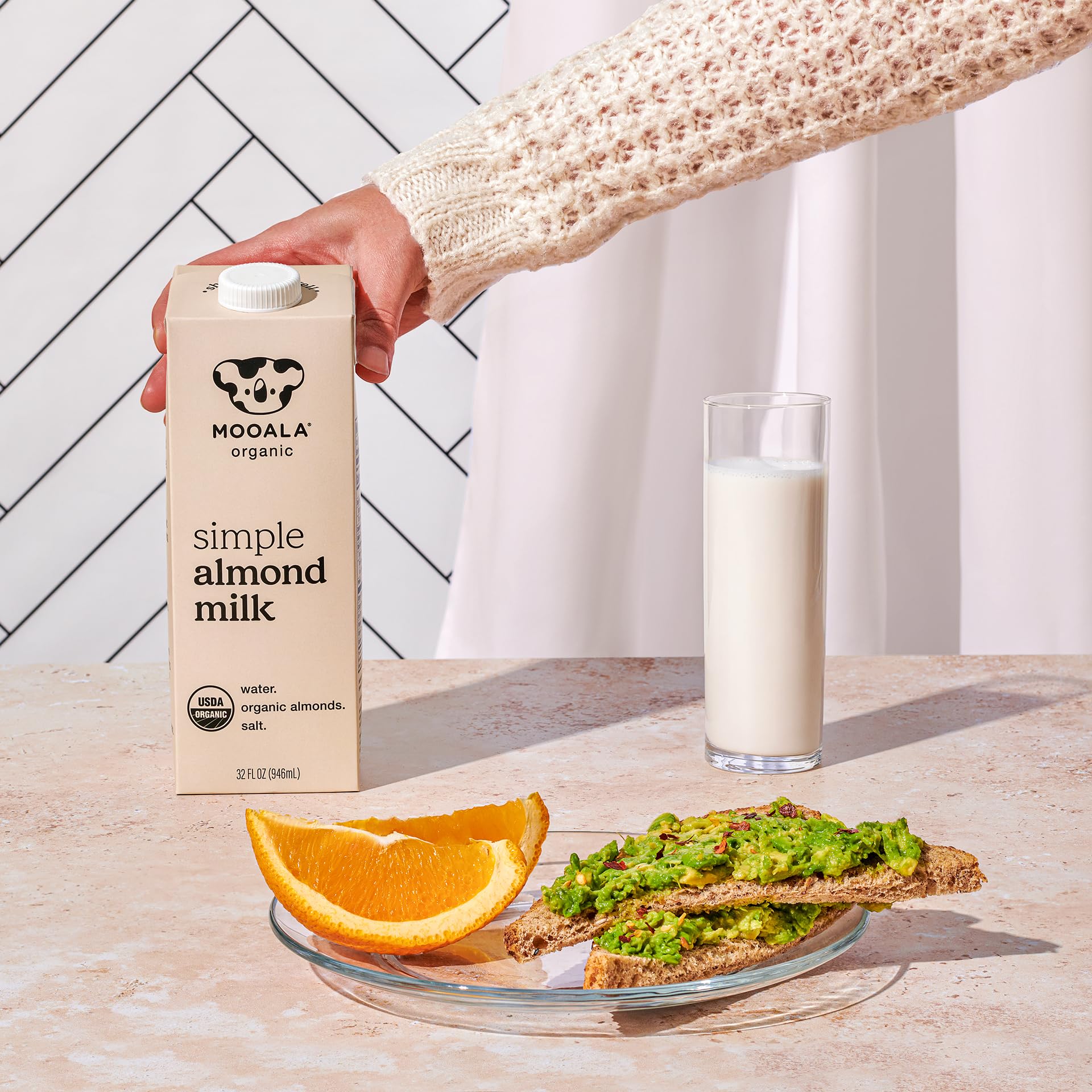 Mooala Almond Milk smoothie being blended for a nutritious drink.